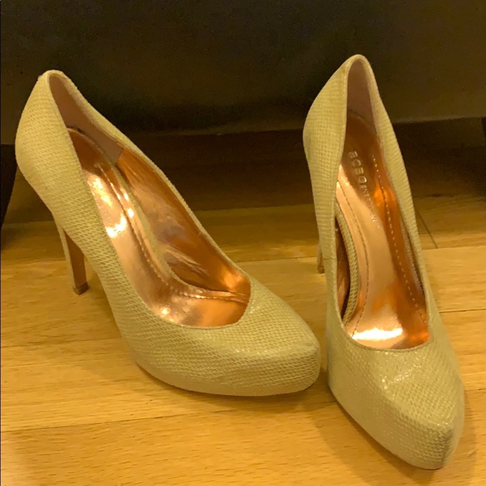 BCBG Gold Pumps